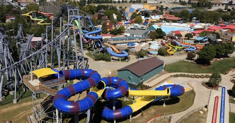 Kentucky kingdom - Kentucky Kingdom is an amusement park located in Louisville, Kentucky. It covers an area of 63 acres and is home to more than 70 rides and attractions, including six roller coasters. The park opened in 1987 as a part of the Six Flags chain of amusement parks. In 2010, it was purchased by the Kentucky State Fair Board, which invested $44 million ...